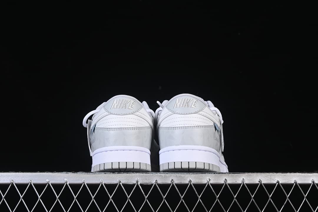 Rear view of the pair showing heel panels and outsoles