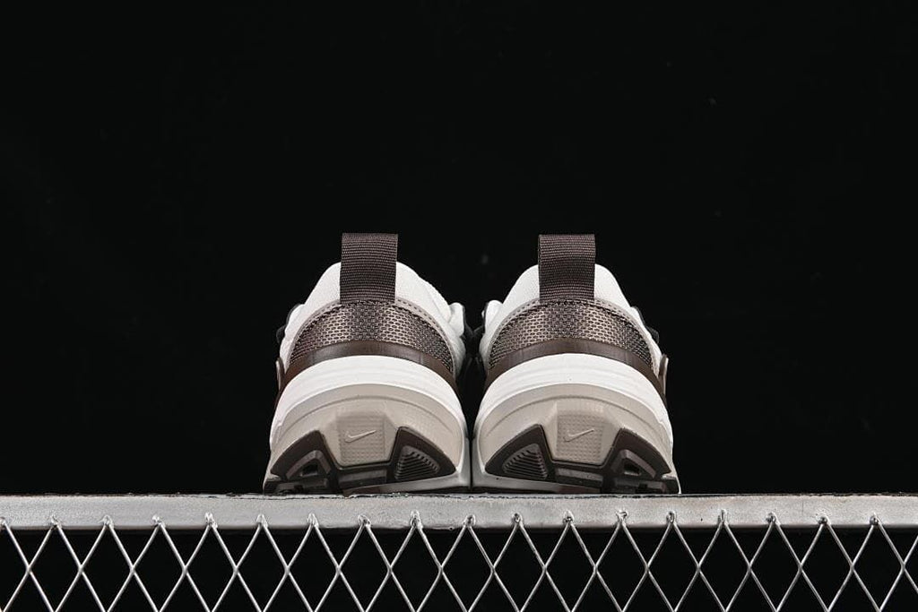 Rear view of the pair showing the heel panels and outsole