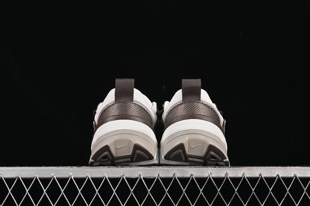 Rear view of the pair showing the heel panels and outsole