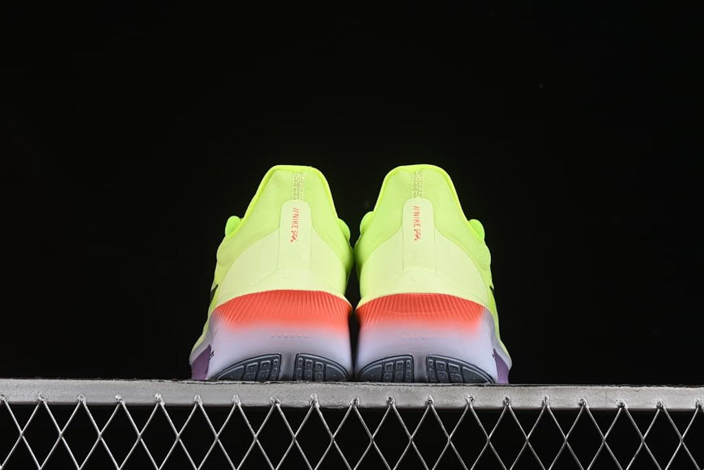 Rear view of the pair showing coral heel accents and the outsole.