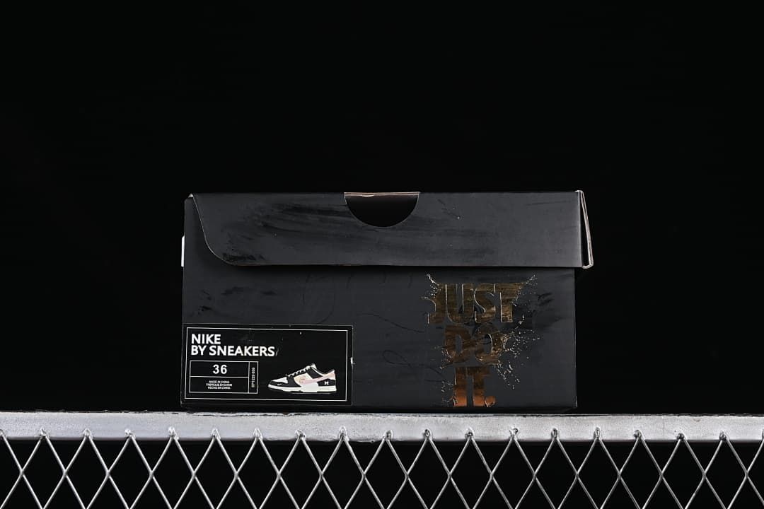 Black shoe box with a size label showing 36