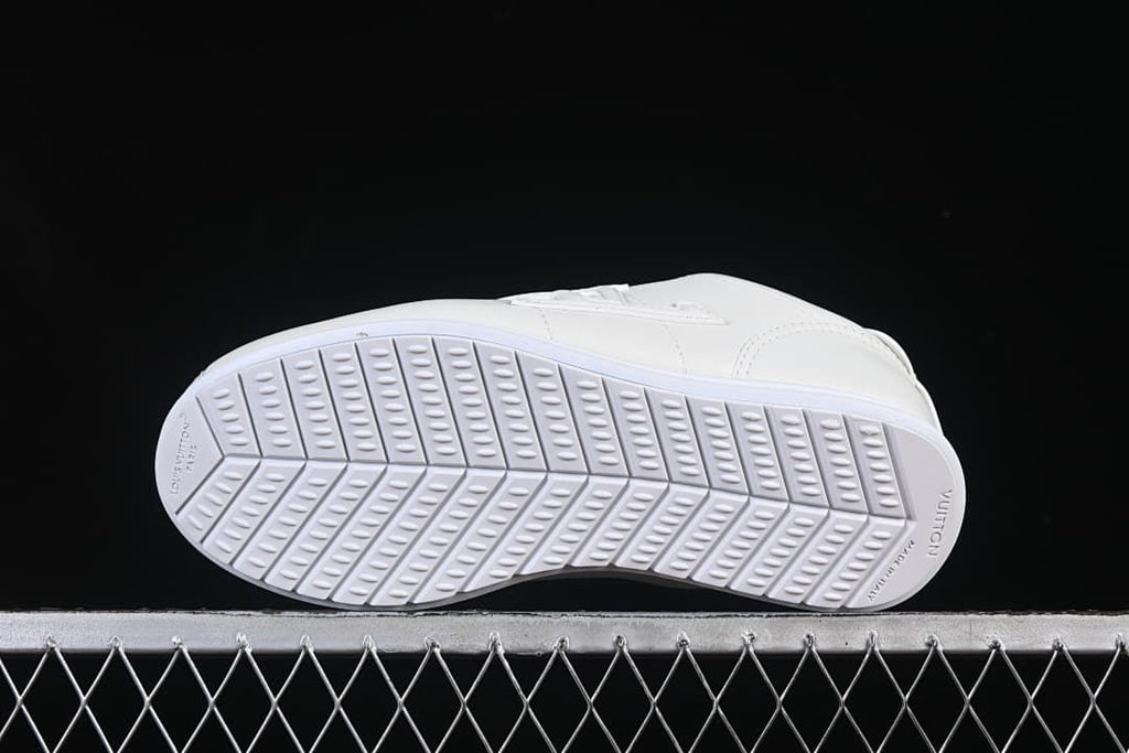 Underside view showing the patterned white outsoles