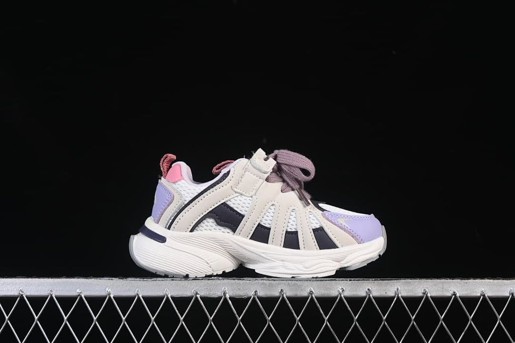Side profile of one cream, white, lavender, navy, and pink sneaker