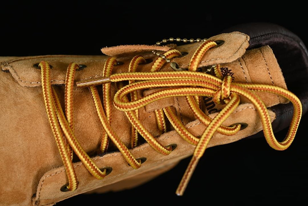 Close-up of the lace-up front and metal eyelets