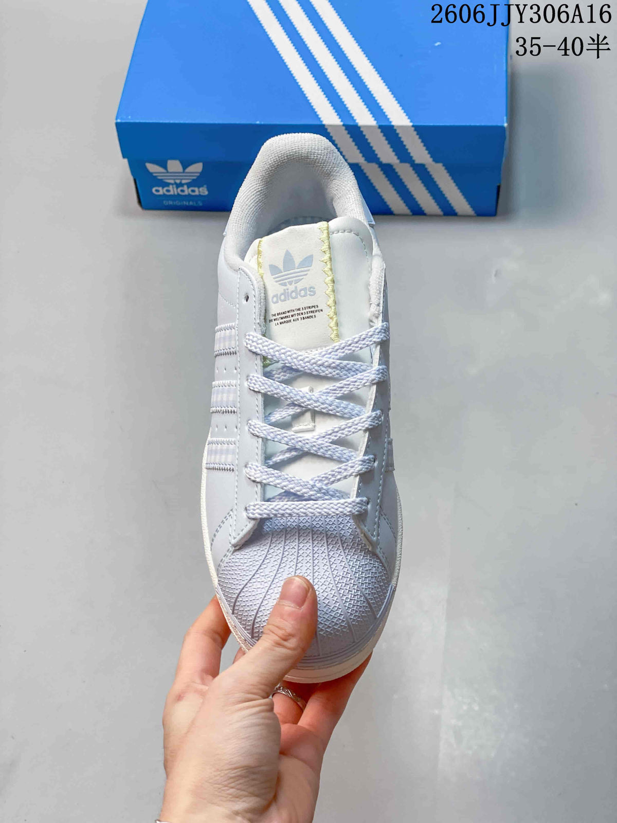 Front view of the lace-up sneaker and textured shell toe