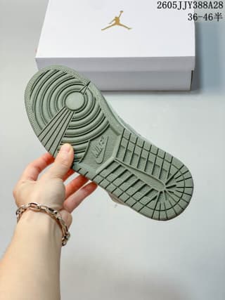 Underside of the sneaker showing its patterned rubber outsole.