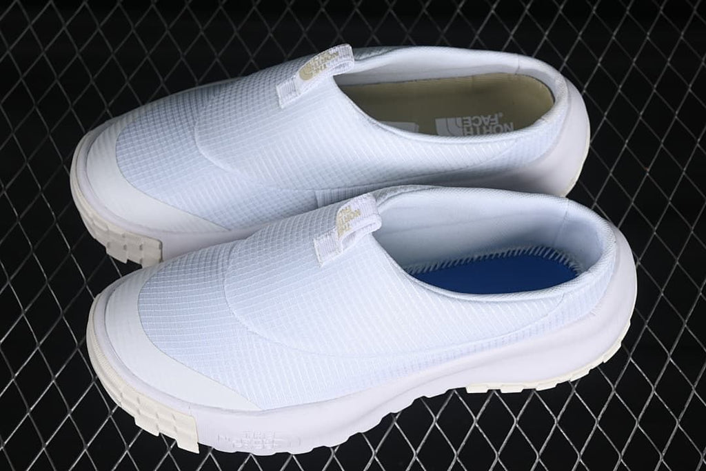 Pair of white The North Face slip-on mule sneakers