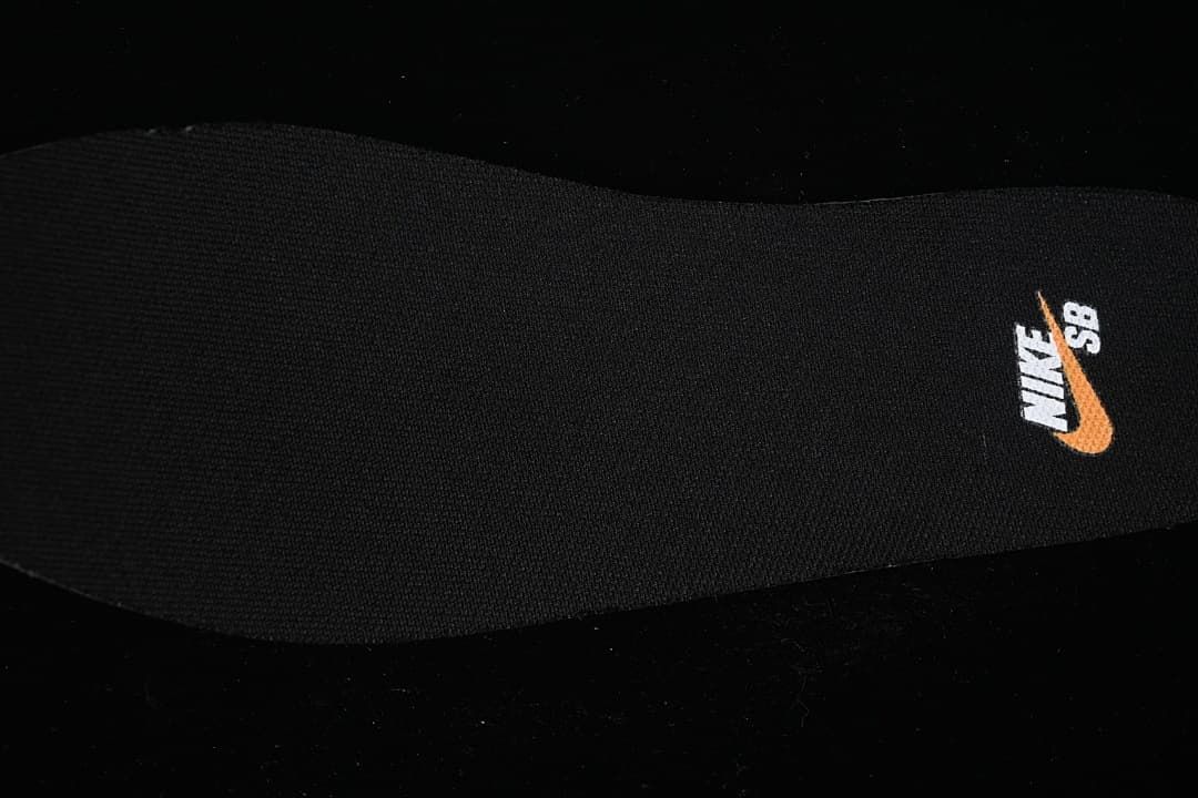 Close-up of a black insole with Nike SB branding.