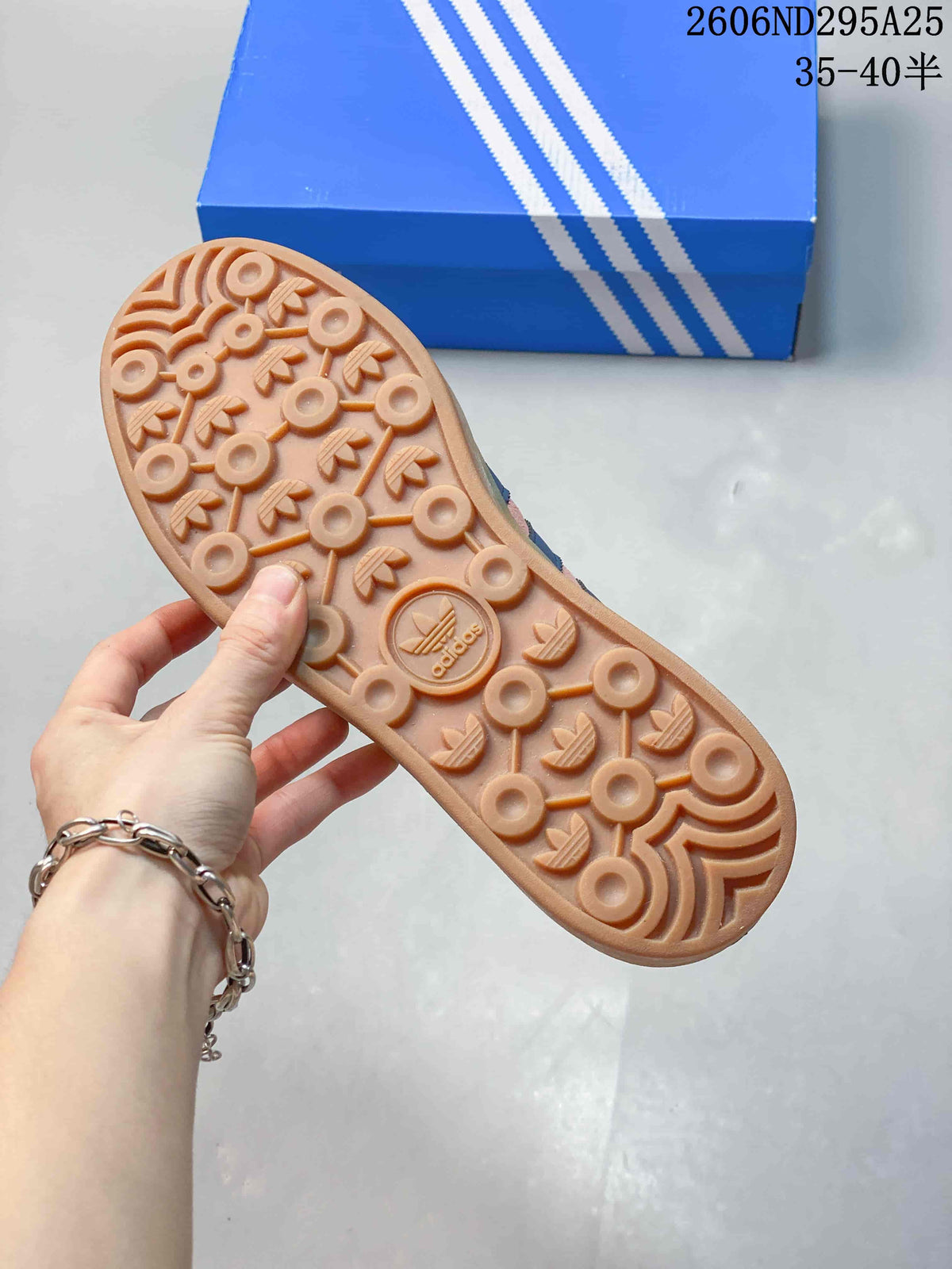 Underside of a sneaker showing a patterned gum-look outsole