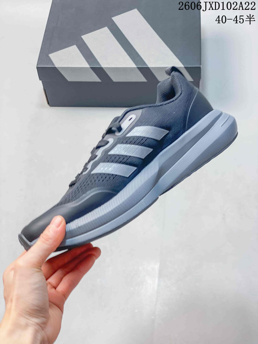 Side profile of a gray Adidas SL 72 Boost shoe