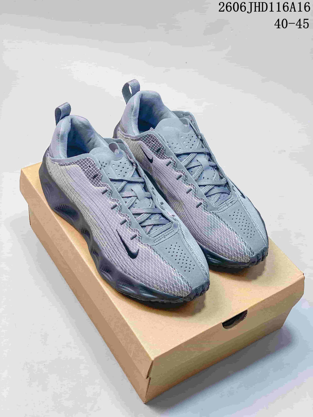 Pair of gray Nike Ava Rover Hs shoes viewed from above at an angle