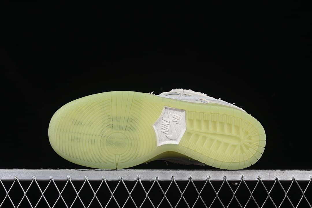 Bottom view of the translucent light-green outsole