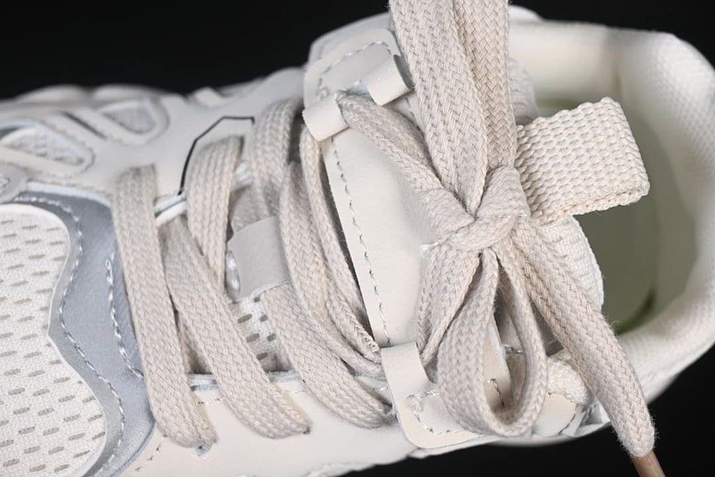 Close-up of the sneaker’s laces and hook-and-loop strap
