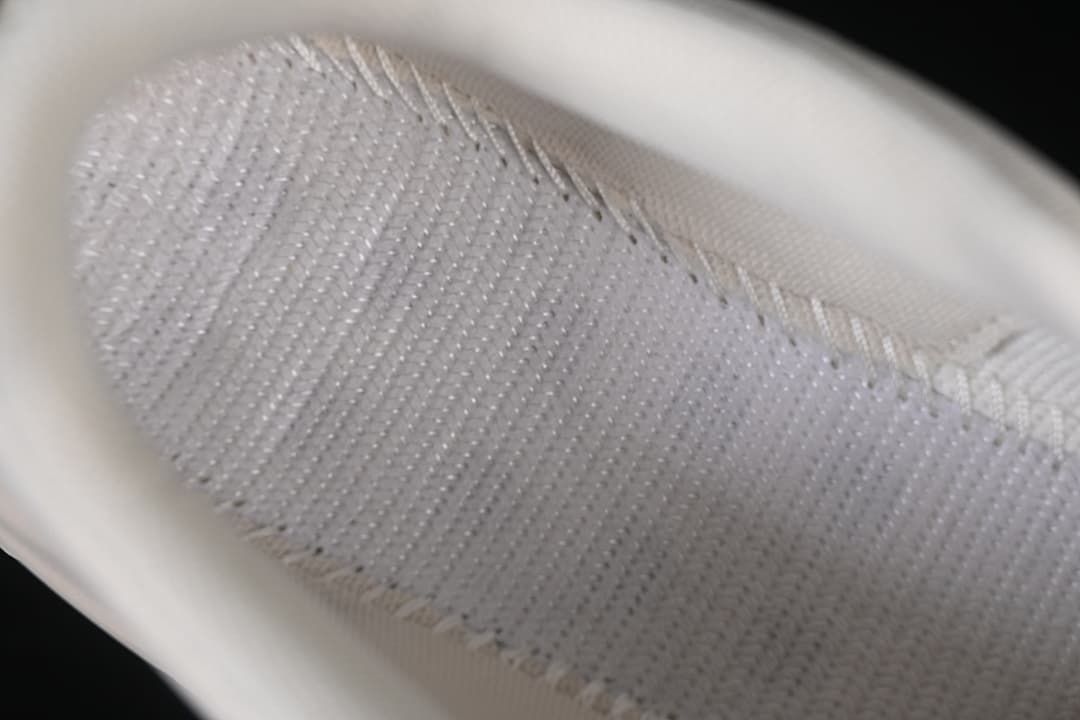 Close-up of the shoe's textured upper and stitching