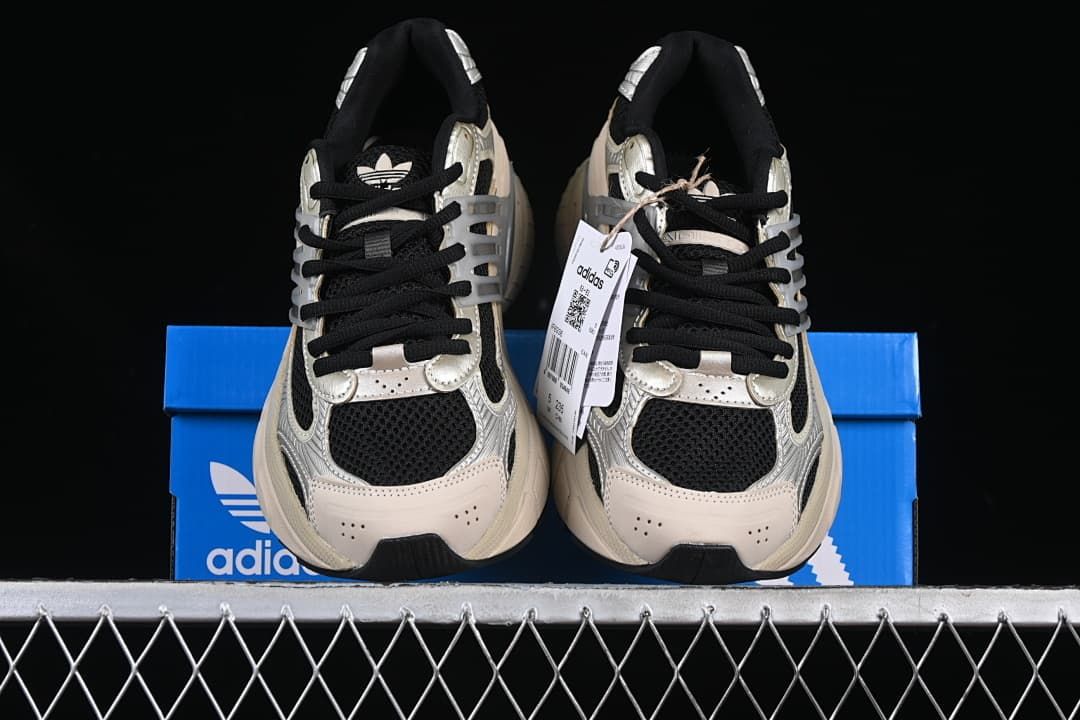 Front view of the pair showing mesh toe panels and black laces