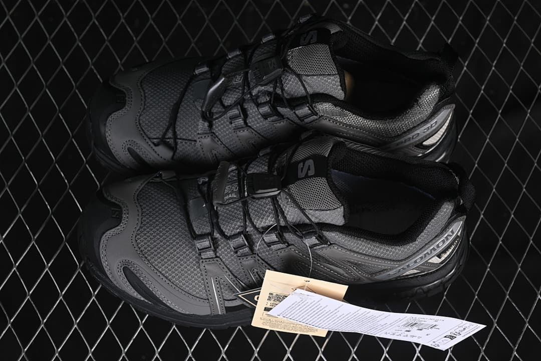Pair of gray trail shoes shown from above at an angle.