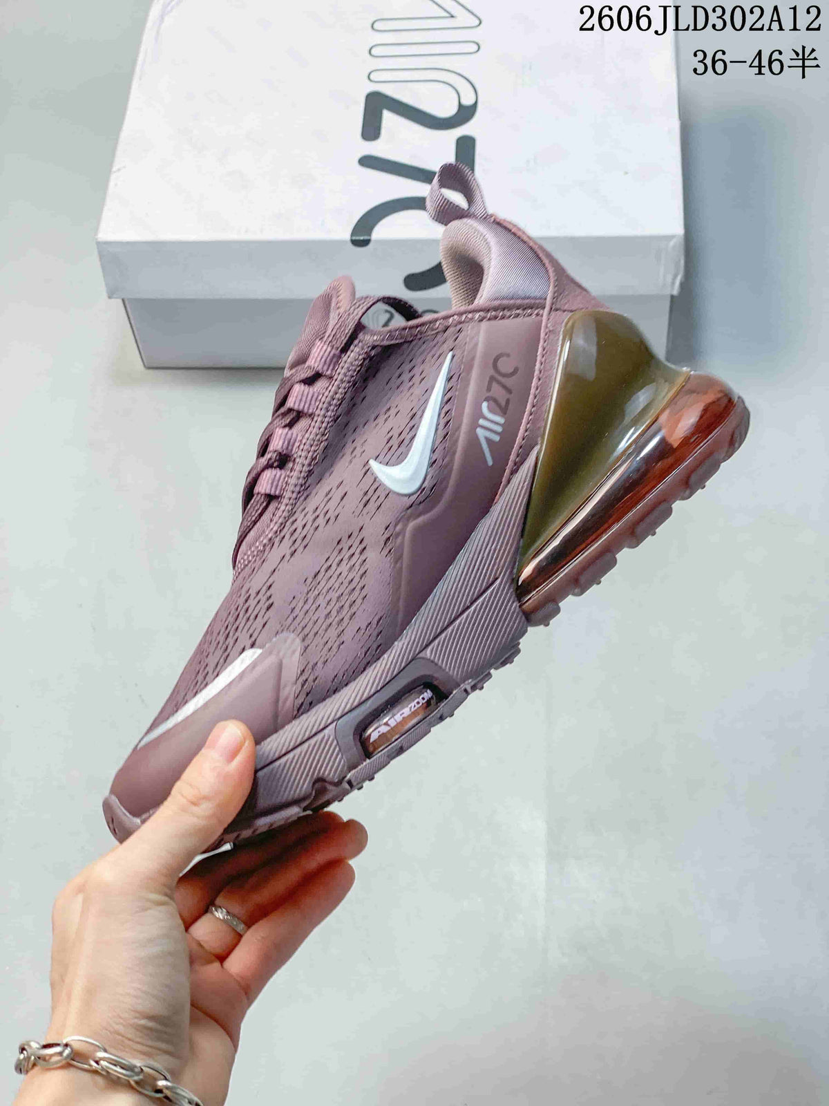 Side view of a mauve Nike Air Max 270 sneaker