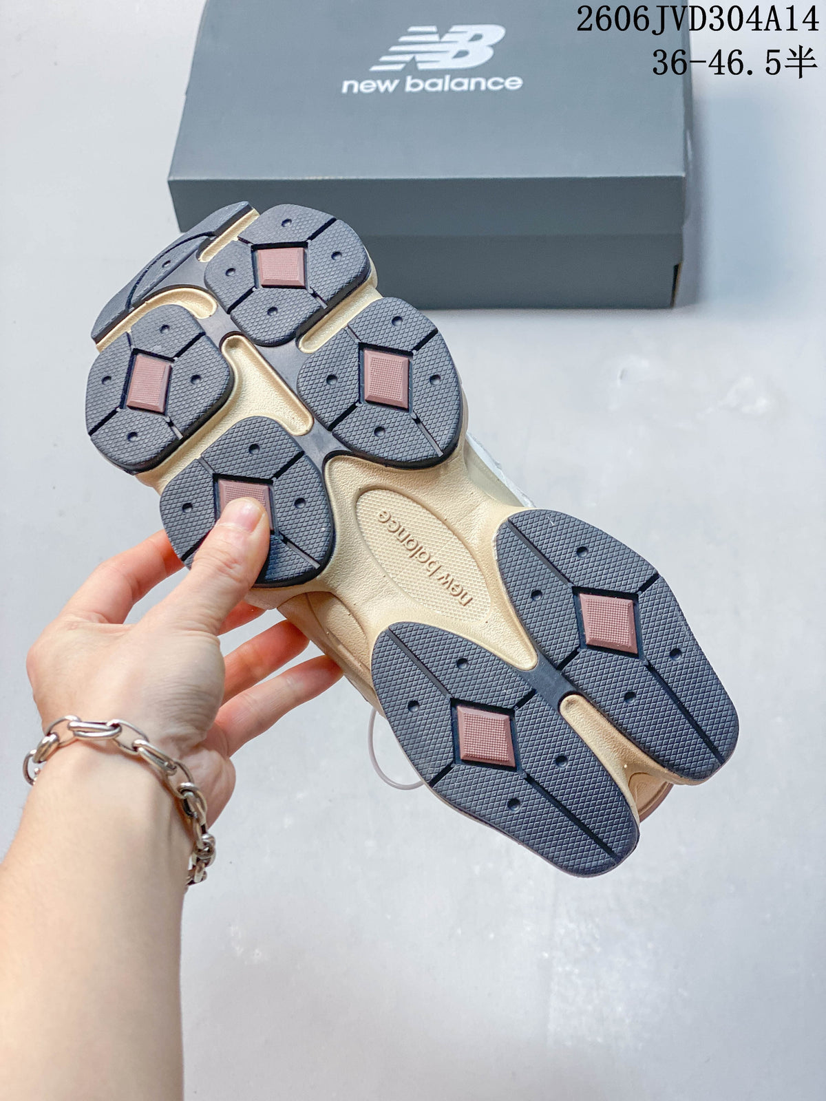 Underside of a New Balance 9060 sneaker showing the segmented outsole