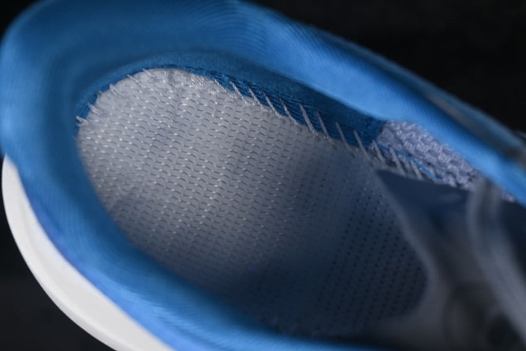 Close-up of the blue-lined interior and insole.