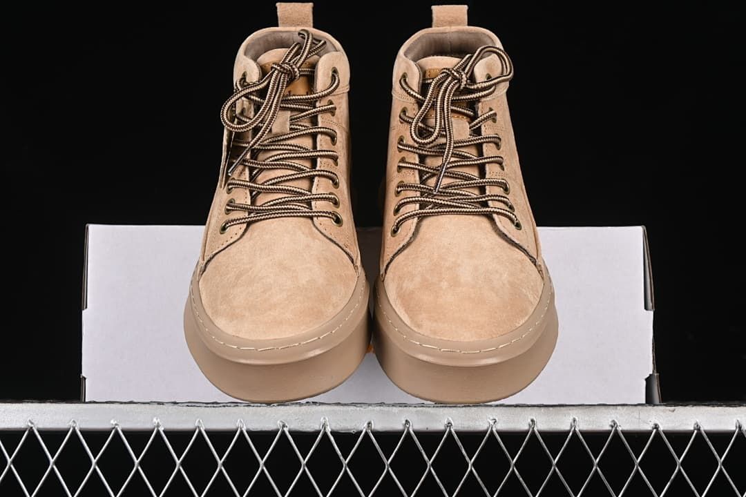 Front view of the pair of lace-up boots