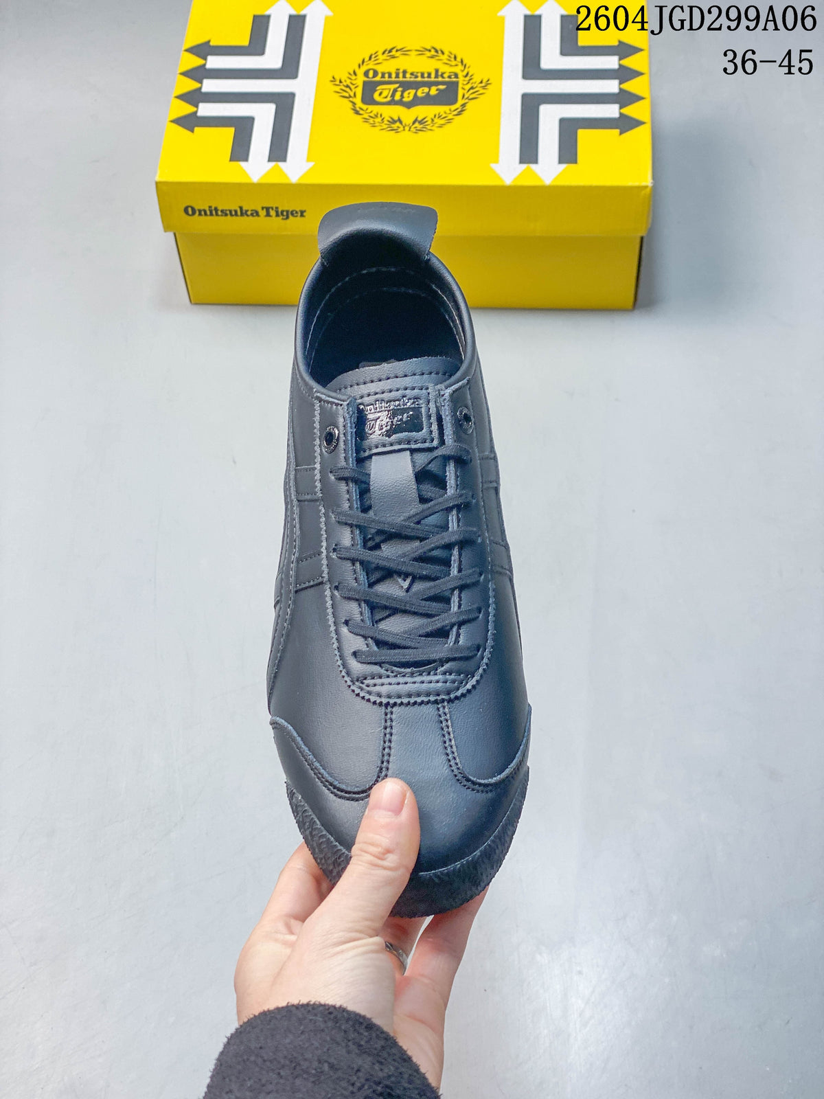 Front view of a charcoal gray lace-up sneaker