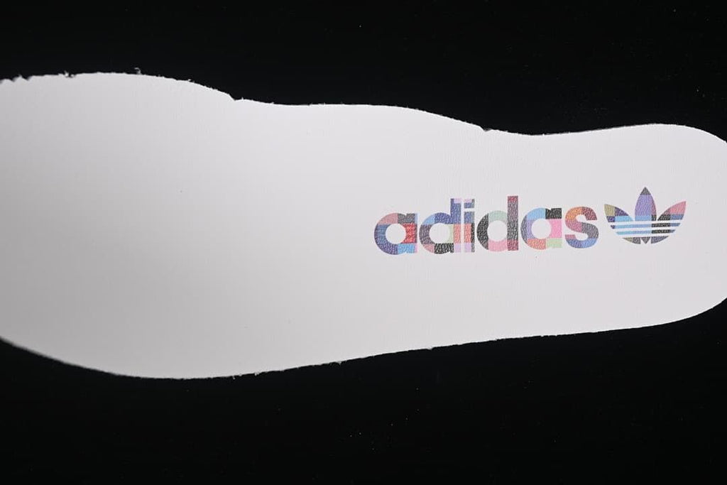 White insole with adidas Trefoil branding
