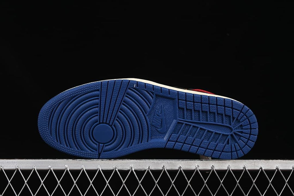 Underside view of the blue outsole and tread pattern