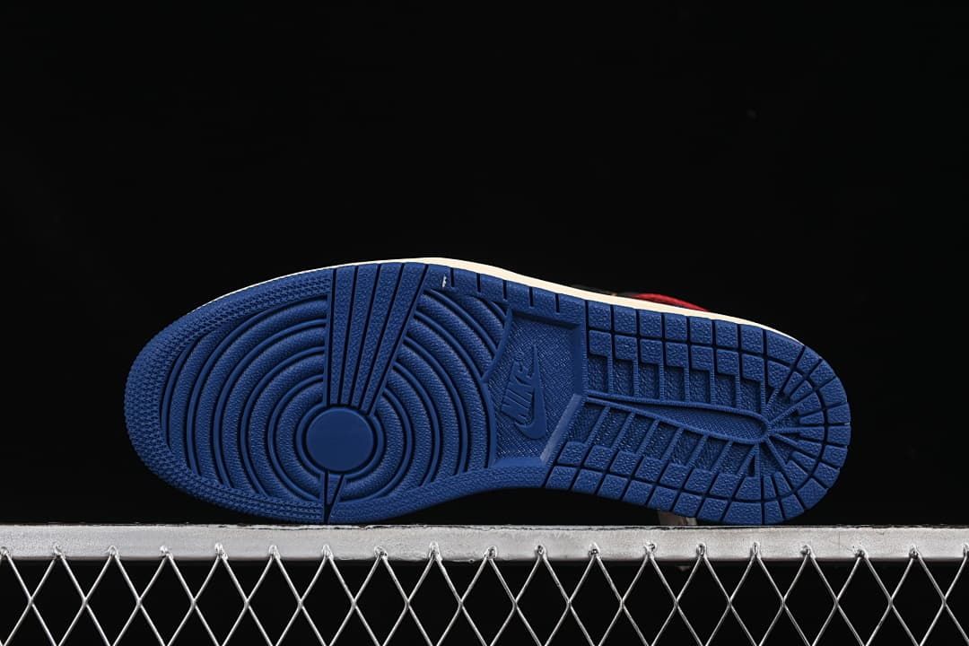 Underside view of the blue outsole and tread pattern