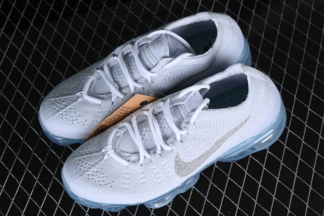 Pair of white VaporMax sneakers viewed from above at an angle
