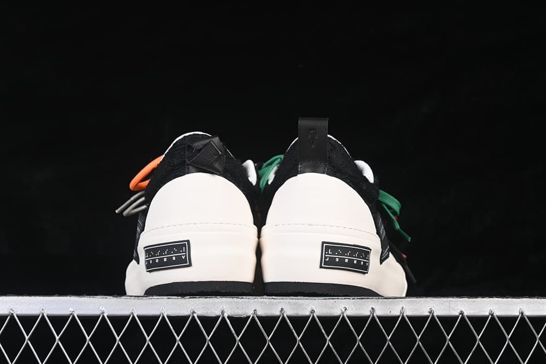 Rear view of both shoes with white platform heels