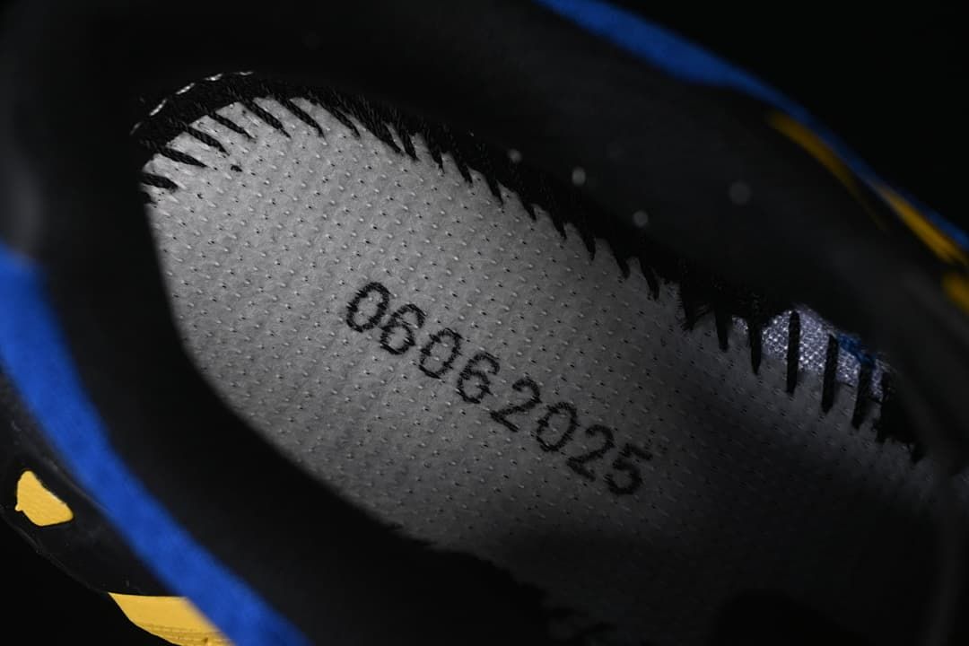 Close-up inside the shoe showing a printed date marking