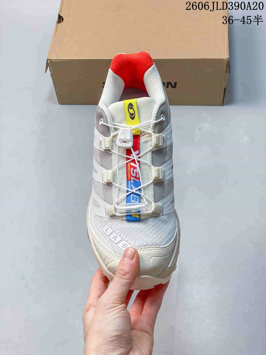 Top view showing the quick-lace system and red tongue accent.