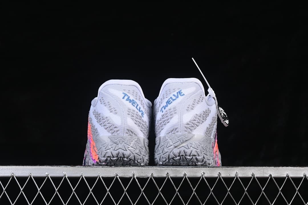 Rear view of the shoes with blue heel lettering