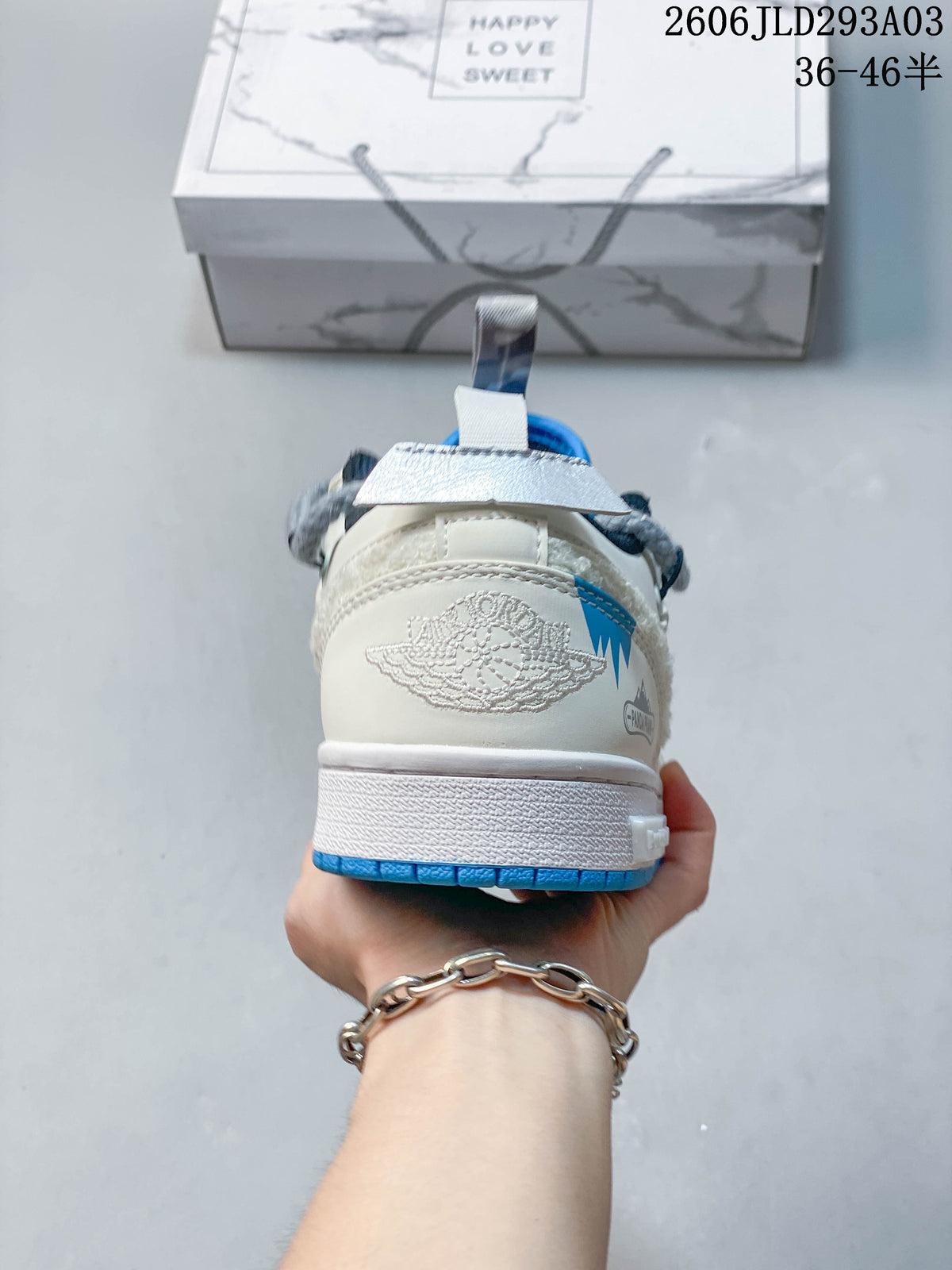 Rear view showing the heel and blue outsole
