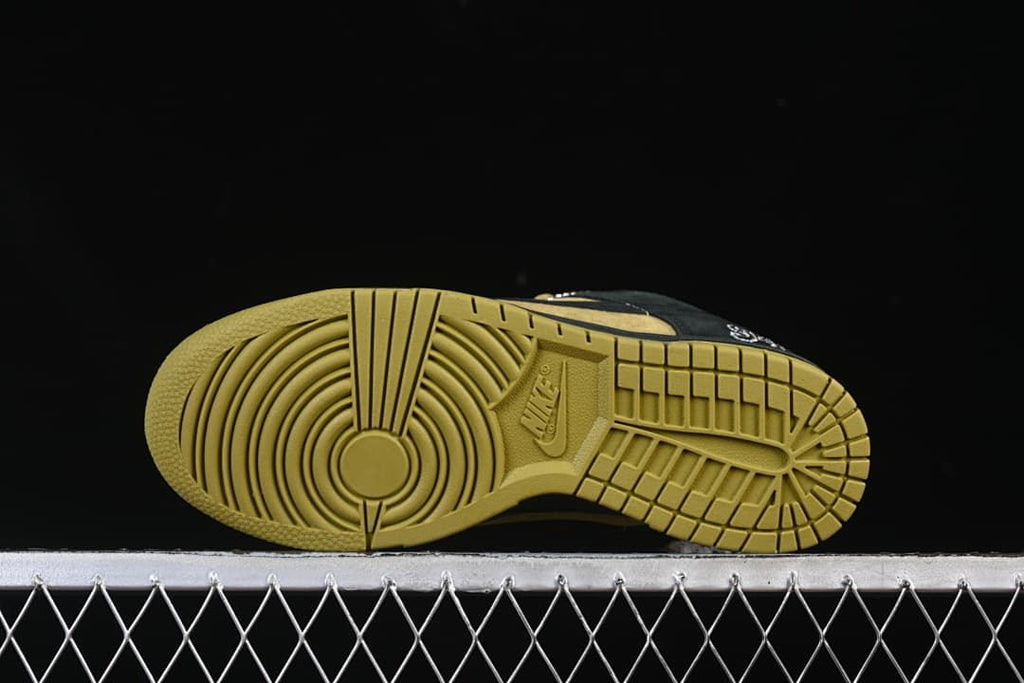 Underside view of the gum-colored outsole and tread pattern