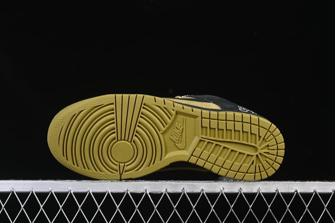 Underside view of the gum-colored outsole and tread pattern