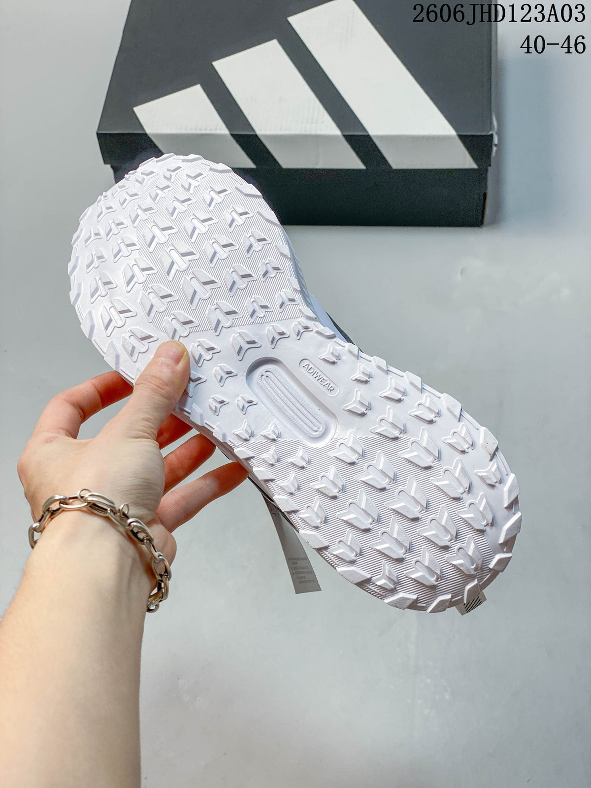 Close-up of the raised tread pattern on the sneaker outsole