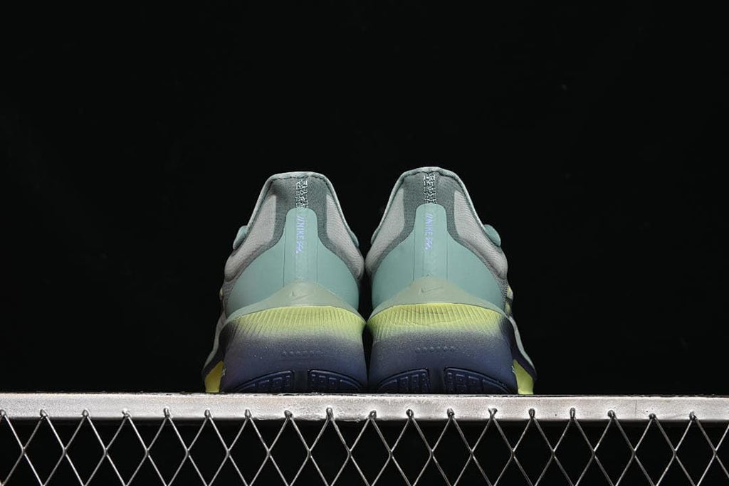 Rear view of both shoes showing heel and outsole colors