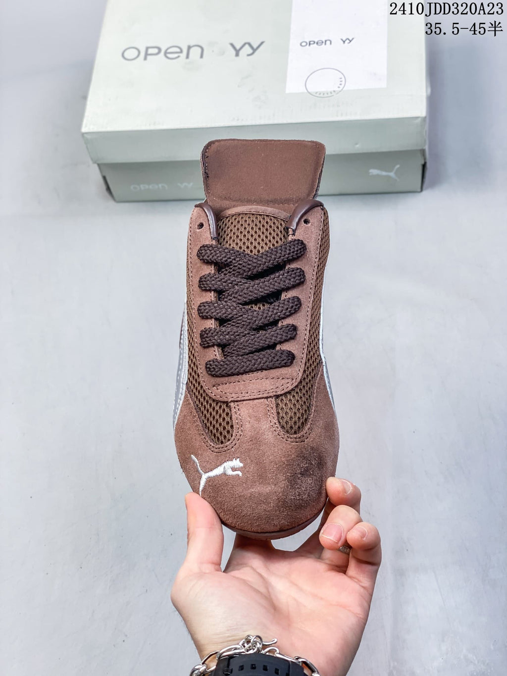 Front view of the brown Puma Speedcat sneaker with dark laces and a raised tongue
