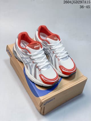 Pair of white and red ASICS Gel-Flux CN sneakers displayed on an ASICS shoebox.
