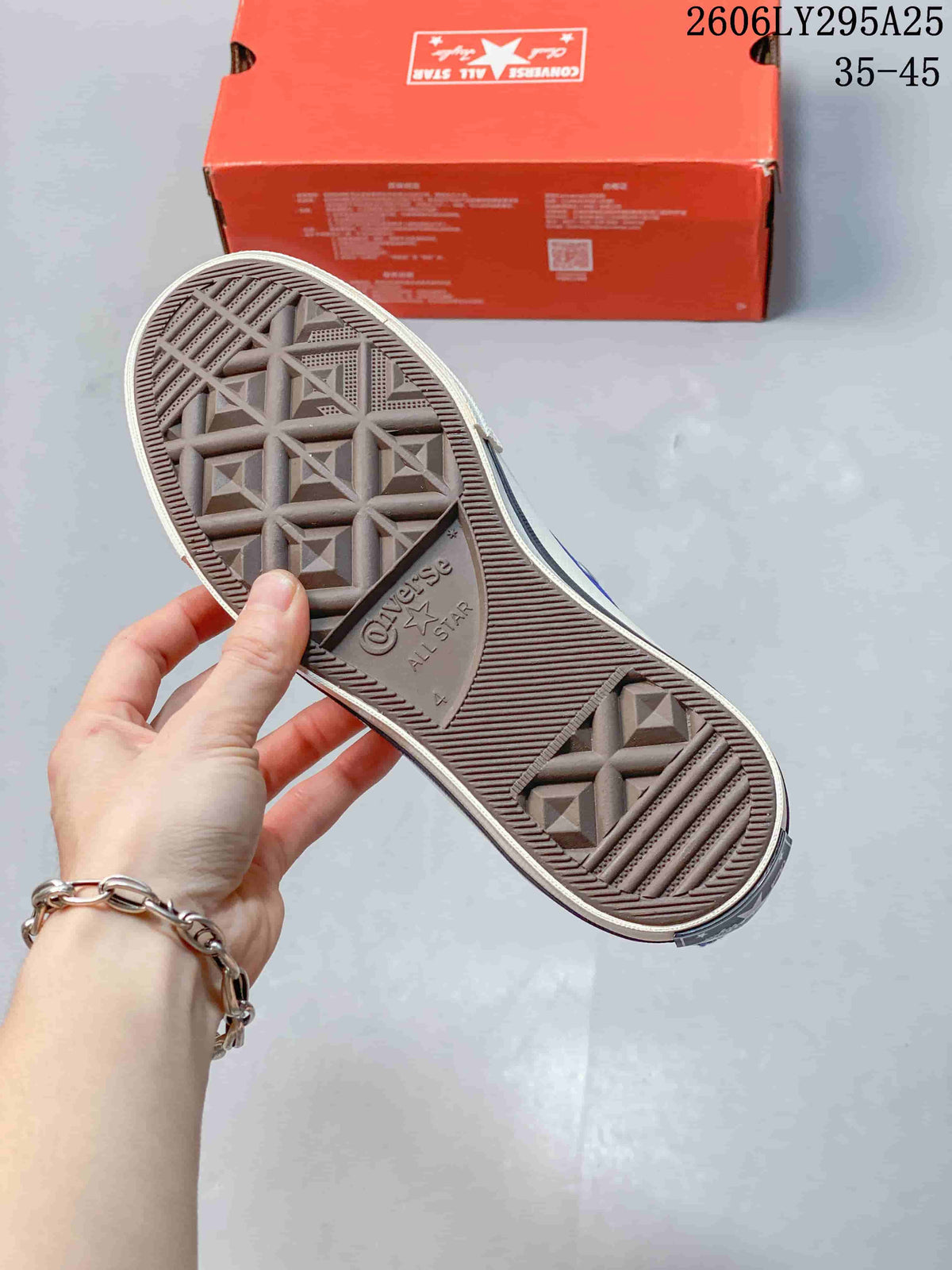 Textured outsole of the blue high-top sneaker