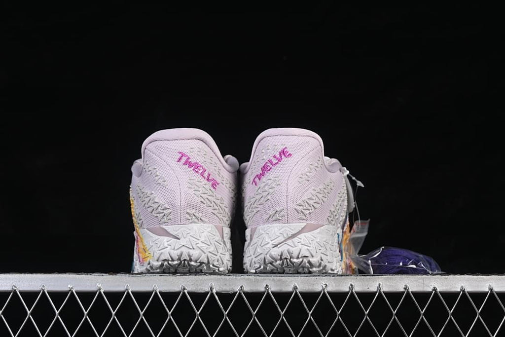 Rear view of the pair showing heel details and textured soles