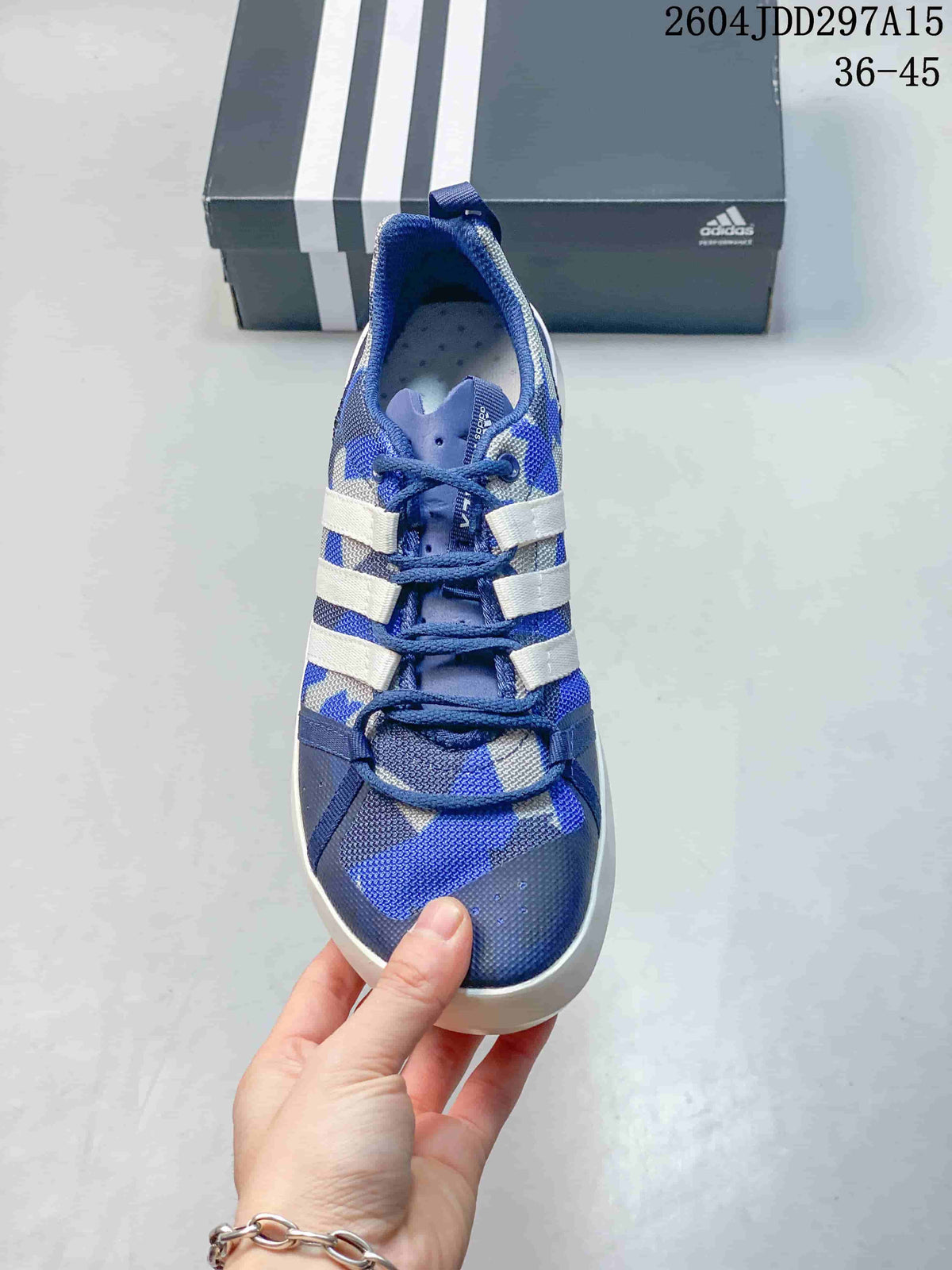 Top view of a blue adidas Terrex CC Boat shoe with lace-up front
