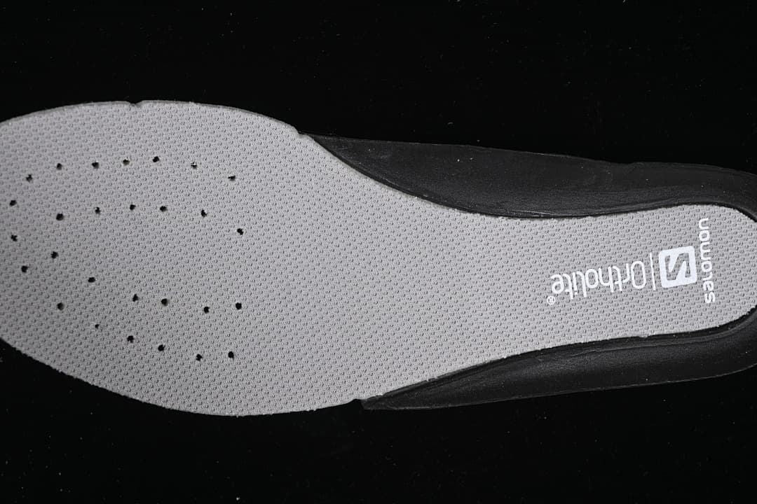 Close-up of the perforated footbed and Salomon Ortholite branding