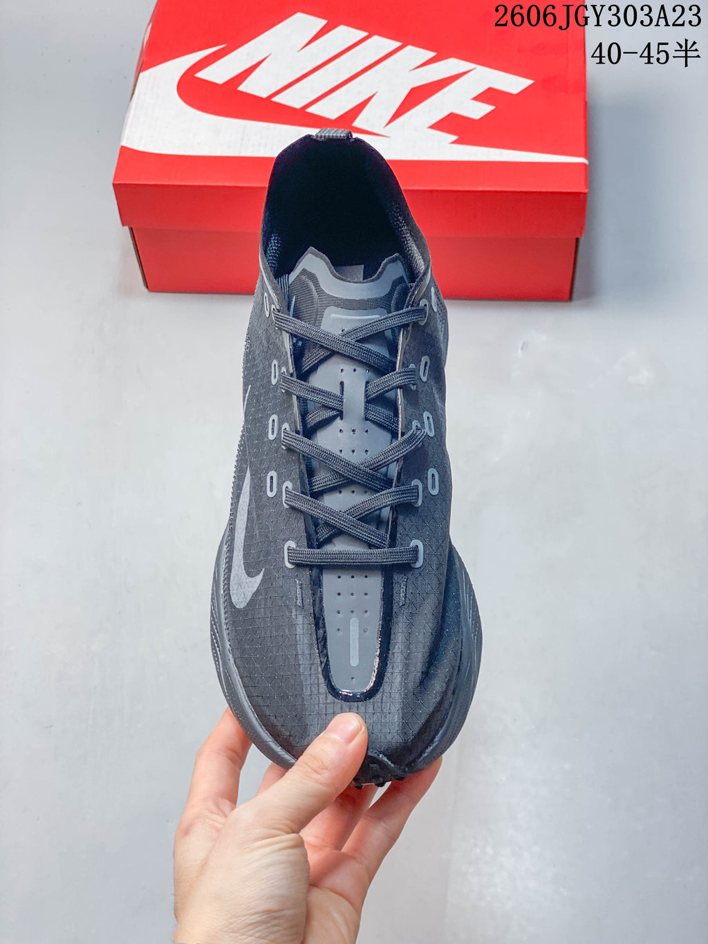 Top view of a dark Nike Ava Rover shoe with lace-up closure