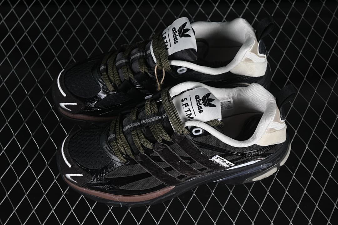 Pair of black Adistar Cushion SFTM sneakers shown from above.