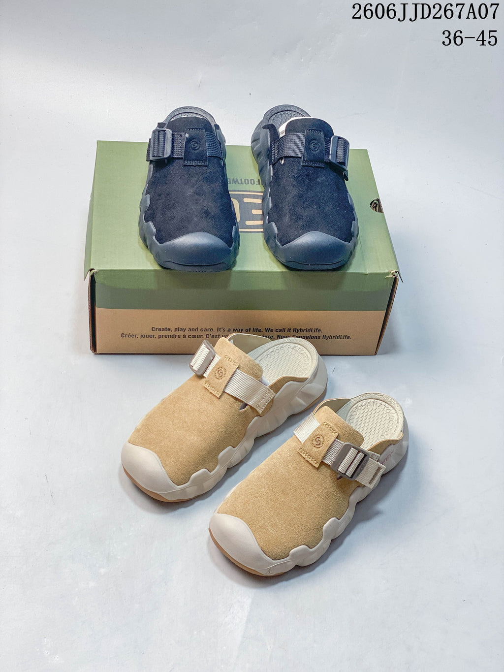 Navy and tan colorways of closed-toe clog-style mules