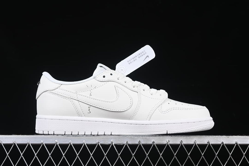 Side profile showing the white upper, reverse-style Swoosh, and graphic detail.