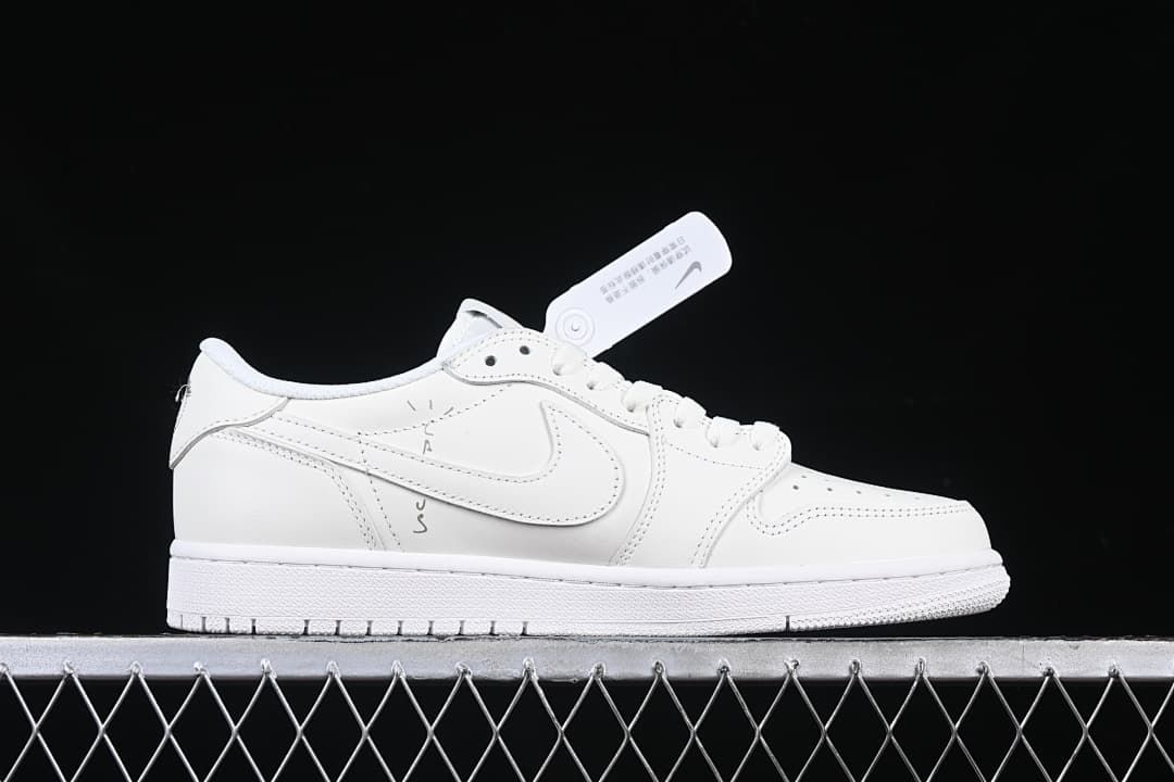 Side profile showing the white upper, reverse-style Swoosh, and graphic detail.