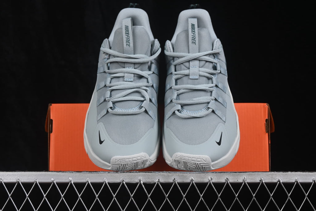 Front view of the pair showing the laces, mesh toe boxes and Nike branding.